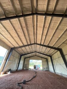 Spray foam on the ceiling of a pole barn in Bear Lake Utah